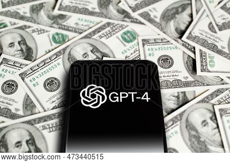 Gpt-4 Logo On Screen Smartphone On Background Of Dollars. Gpt-4 Is A Chatbot By Openai. Moscow, Russ