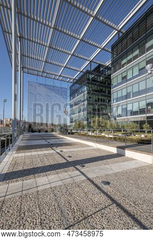 Office Buildings With Glass And Metal Facades With Latticework And Metal Roofs