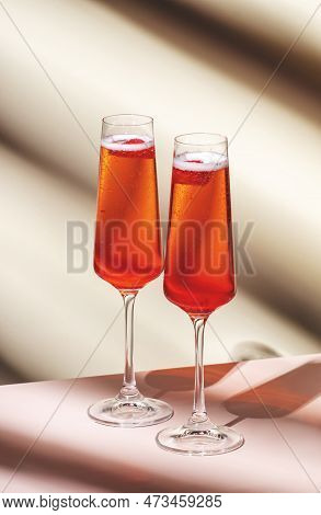 Rossini Summer Alcoholic Cocktail Drink With Sparkling Wine Or Prosecco, Strawberry Puree And Ice In