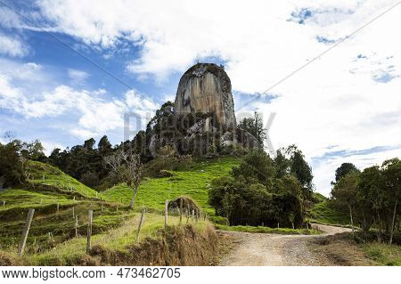 Monolith 22 Meters High Above Ground Level, Located In The Municipality Of Entrerrios In Antioquia, 