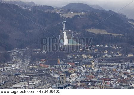 Innsbruck, Austria - February 26, 2023: Aerial View Of City And Bergisel Ski Jump, Facility Of Fis W