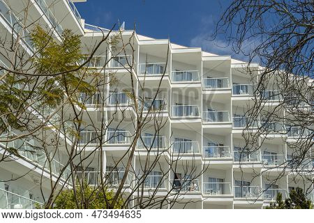Palmanova, Spain; March 19 2023: Main Facade Of The Hotel Of The Company Globales Palmanova On A Sun
