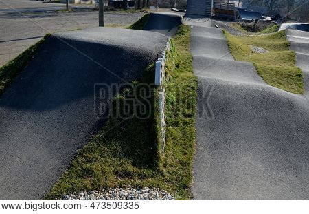 Bike Path In The Car Park Pumping (moving Up And Down) Is Used Instead Of Pedaling And Bouncing To M