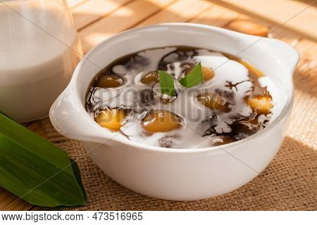 Bubur Candil Or Indonesian Rice Flour Porridge With Sweet Potato Sticky Rice Balls, Served With Palm
