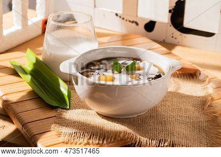 Bubur Candil Or Indonesian Rice Flour Porridge With Sweet Potato Sticky Rice Balls, Served With Palm