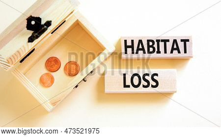 Habitat Loss Symbol. Concept Words Habitat Loss On Wooden Block. Beautiful White Table White Backgro