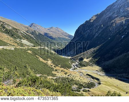 Beautiful Autumn Panorama Of The Alpine Valley Val Grialetsch And The Stream Aua Da Grialetsch In Th