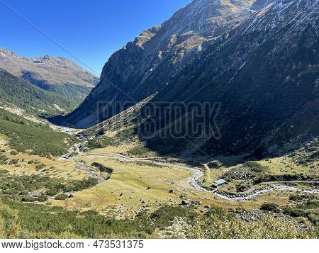 Beautiful Autumn Panorama Of The Alpine Valley Val Grialetsch And The Stream Aua Da Grialetsch In Th