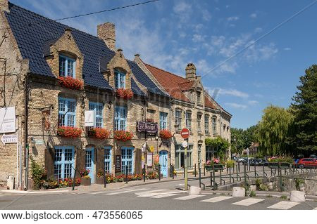 Bergues, France - July 5, 2022: Traditional Houses In The Village Bergues In France, Summer, Holiday