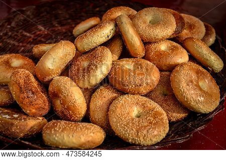 An Old Vendor Selling Baked Naan On The Old Street Of Kashgar