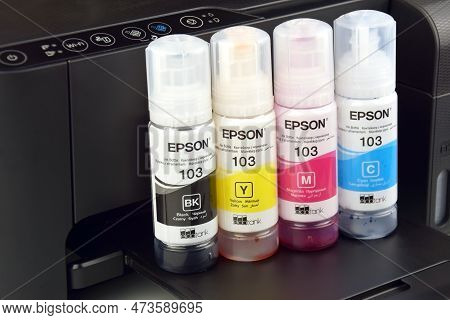 Four Bottles Of Ink Epson, Yellow, Red, Blue, Black, Built-in To The Epson L3150 Series Printer.