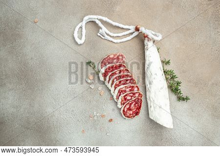 Slices Of Delicious Spanish Sausage Fuet On A Light Background. Banner, Menu, Recipe Place For Text,