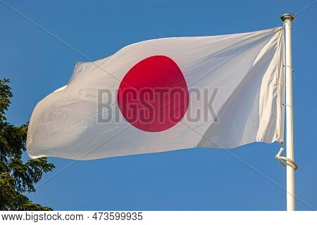 National Flag Of Japan Nisshoki At Blue Sky