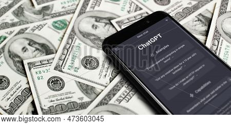 Website Of Chatgpt On Screen Smartphone On Background Of Dollars. Chatgpt Is A Chatbot By Openai. Mo