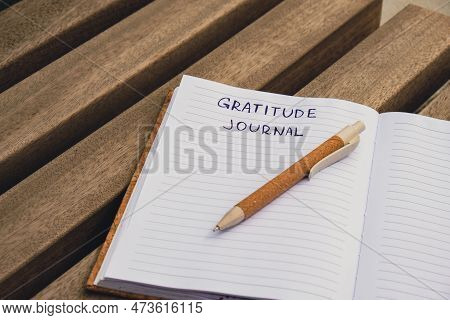 Writing Gratitude Journal On Wooden Bench. Today I Am Grateful For. Self Discovery Journal, Self Ref