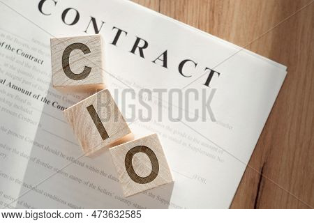 Cio - Short For Chief Investment Officer - Letters On Wooden Cubes.