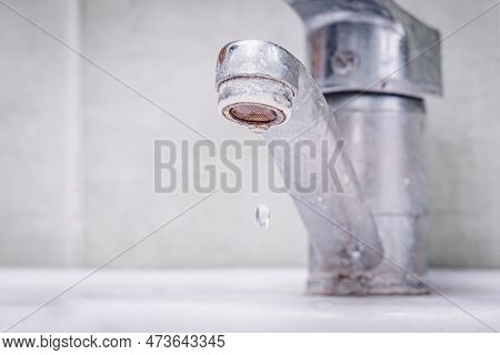 Old Dirty Faucet Covered In Rust And Calx, Toned Photo. Concept Of Unsanitary Conditions, Low Qualit