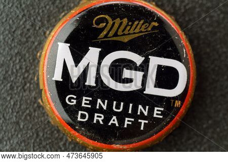 Tyumen, Russia-february 15, 2023: Mgd Logo Retro Cap On Bottle Close Up. Miller Genuine Draft Is The
