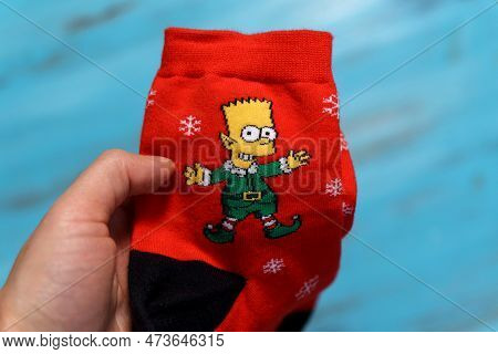 Tyumen, Russia-january 23, 2023: Bart Simpson From The Simpsons Animated Series Logo On Clothes, Chr