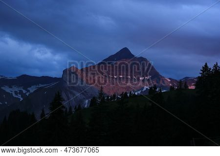 Peak Of Mount Oldehore At Sunset. Switzerland.
