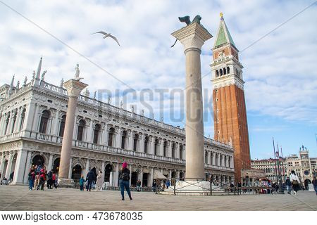 Venice, Italy - January 20, 2023: St Mark's Campanile Bell Tower, The Columns Of San Marco And San T