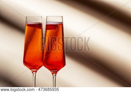 Rossini Summer Alcoholic Cocktail Drink With Sparkling Wine Or Prosecco, Strawberry Puree And Ice In