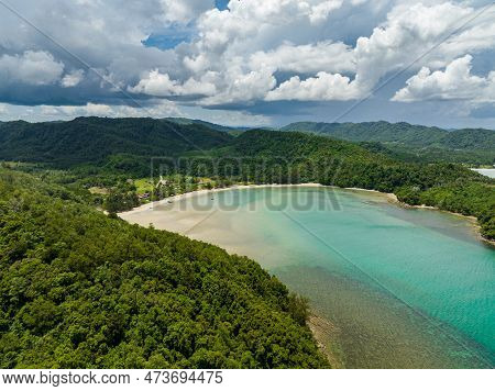 A Bay With A Beautiful Beach Among Tropical Vegetation. Loro Kecil Beach. Borneo, Malaysia.