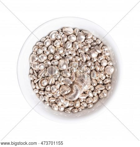 Fine Silver Granules, In A White Bowl, From Above.  Granular Purified Silver, As It Comes Out Of The