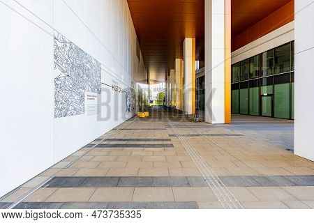 Wroclaw, Poland - June 2022: White And Brown Facade Of A New High-rise Office Building In The 