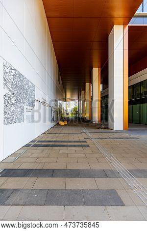 Wroclaw, Poland - June 2022: White And Brown Facade Of A New High-rise Office Building In The \