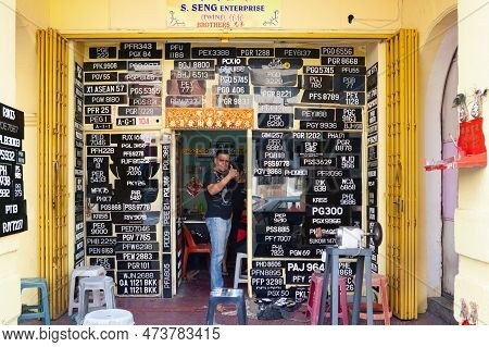 Georgetown, Penang, Malaysia - September 01, 2014: Daily Work At Car Plate Workshop At Street In His