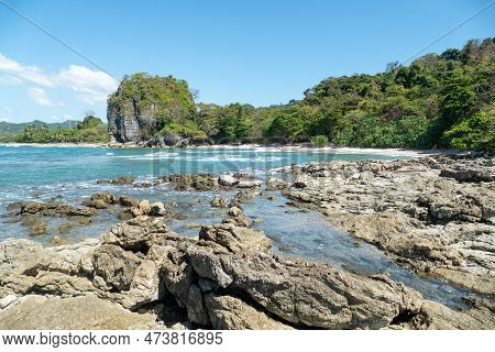 Los Suecos Beach In Malpais, Costa Rrica Under Blue Sky