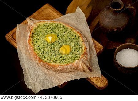 Traditional Georgian Pastry - Adjarian Khachapuri With Cheese And Raw Yolk. Khachapuri With Egg On W