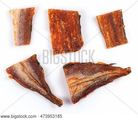 Pieces Of Cleaned Dried Fish Isolated On White. Dry Peppered Pollack. Amber With Pepper Collection.