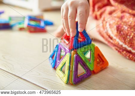 Close-up Of A Triangle From A Childrens Magnetic Color Constructor