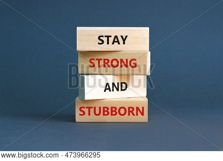 Stay Strong And Stubborn Symbol. Concept Words Stay Strong And Stubborn On Wooden Block. Beautiful G
