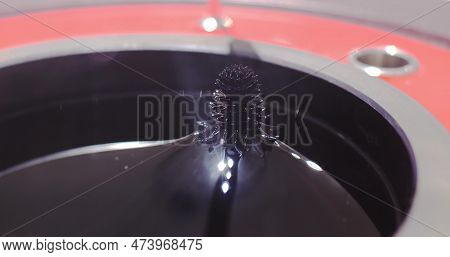 Experiment On The Movement Of A Ferromagnetic Black Liquid Under The Action Of A Magnetic Field. Fer