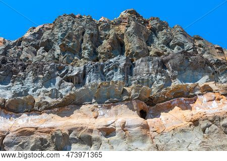 Grey Mountain Rock . Rocky Mountain Peak Against Sky