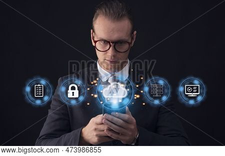 Businessman Holding Smartphone With Online Cloud Documentation Database And Document Management Syst
