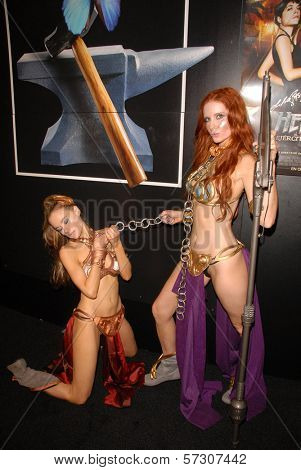 Paula Labaredas and Phoebe Price at the annual Slave Leia Group Photo at ComicCon, San Diego Convention Center, San Diego, CA. 07-23-10