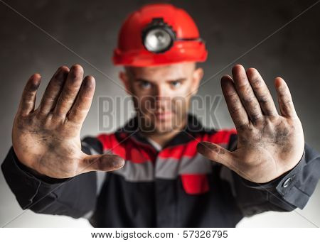 Coal Miner Making Stop Gesture