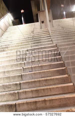 illuminated pale concrete steps