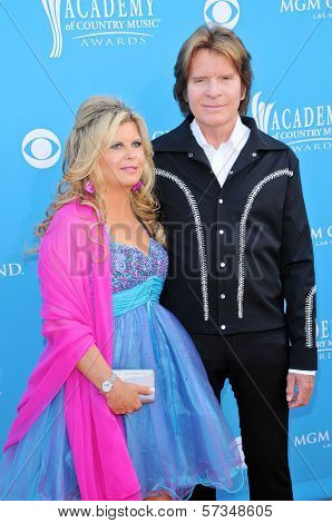 John Fogerty and Wife Julie at the 45th Academy of Country Music Awards Arrivals, MGM Grand Garden Arena, Las Vegas, NV. 04-18-10
