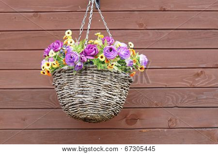pot of flowers on the wall