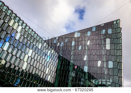 REYKJAVIK, ICELAND - AUGUST 31, 2013: Fragment of Harpa concert hall, Reykjavik, Iceland. Harpa was opened on May 13, 2011. It was selected as Best Performance Venue 2011 by Travel & Leisure magazine
