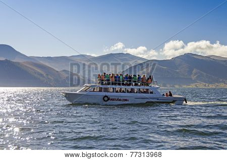  COPACABANA, BOLIVIA, MAY 7, 2014: Touristic boat transports tourists from Copacabana to Isla del sol on Titicaca lake