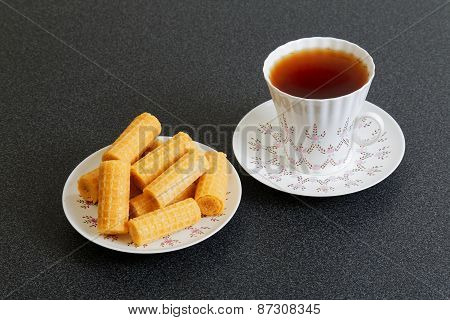 Waffer Rolls And Cup Of China Tea