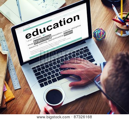 Man Reading the Definition of Education