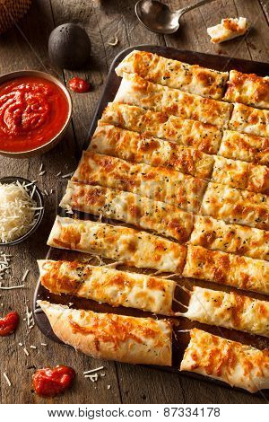 Homemade Cheesy Breadsticks With Marinara