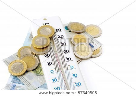 Thermometer And Money Isolated On White Background
